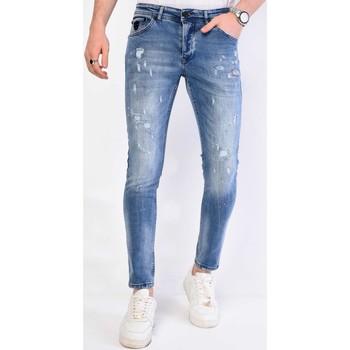 Kleidung Herren Slim Fit Jeans Local Fanatic Hose Mit Farbspritzern Slim Blau