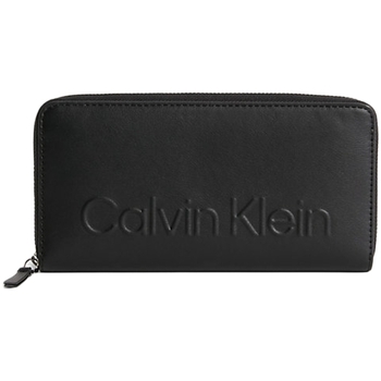 Taschen Damen Portemonnaie Calvin Klein Jeans Zippe logo relief Schwarz