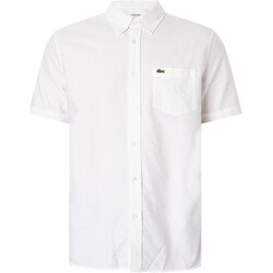 Kleidung Herren Kurzärmelige Hemden Lacoste Kurzarmhemd mit regulärem Logo Weiss
